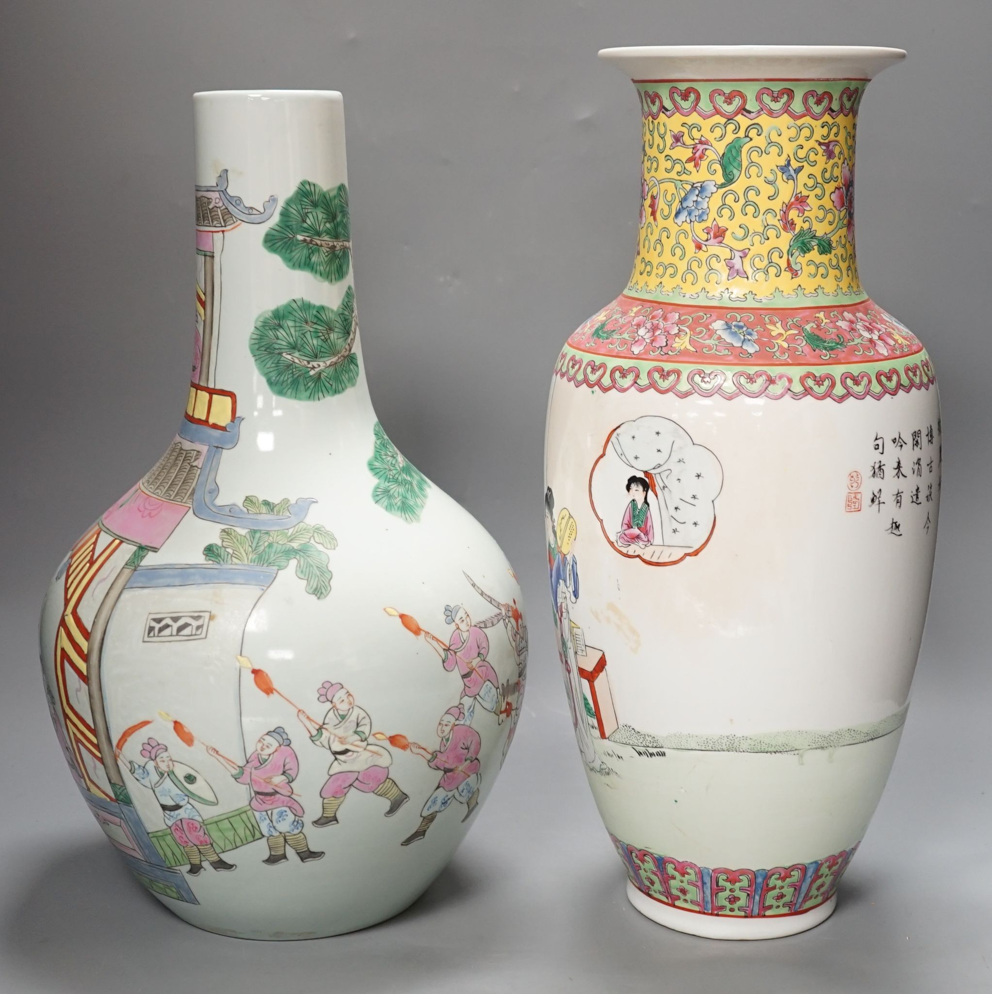 Two Chinese famille rose vases, tallest 42 cms high.